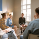 Group discussion in a bright room about what is rapid cycling bipolar disorder​.